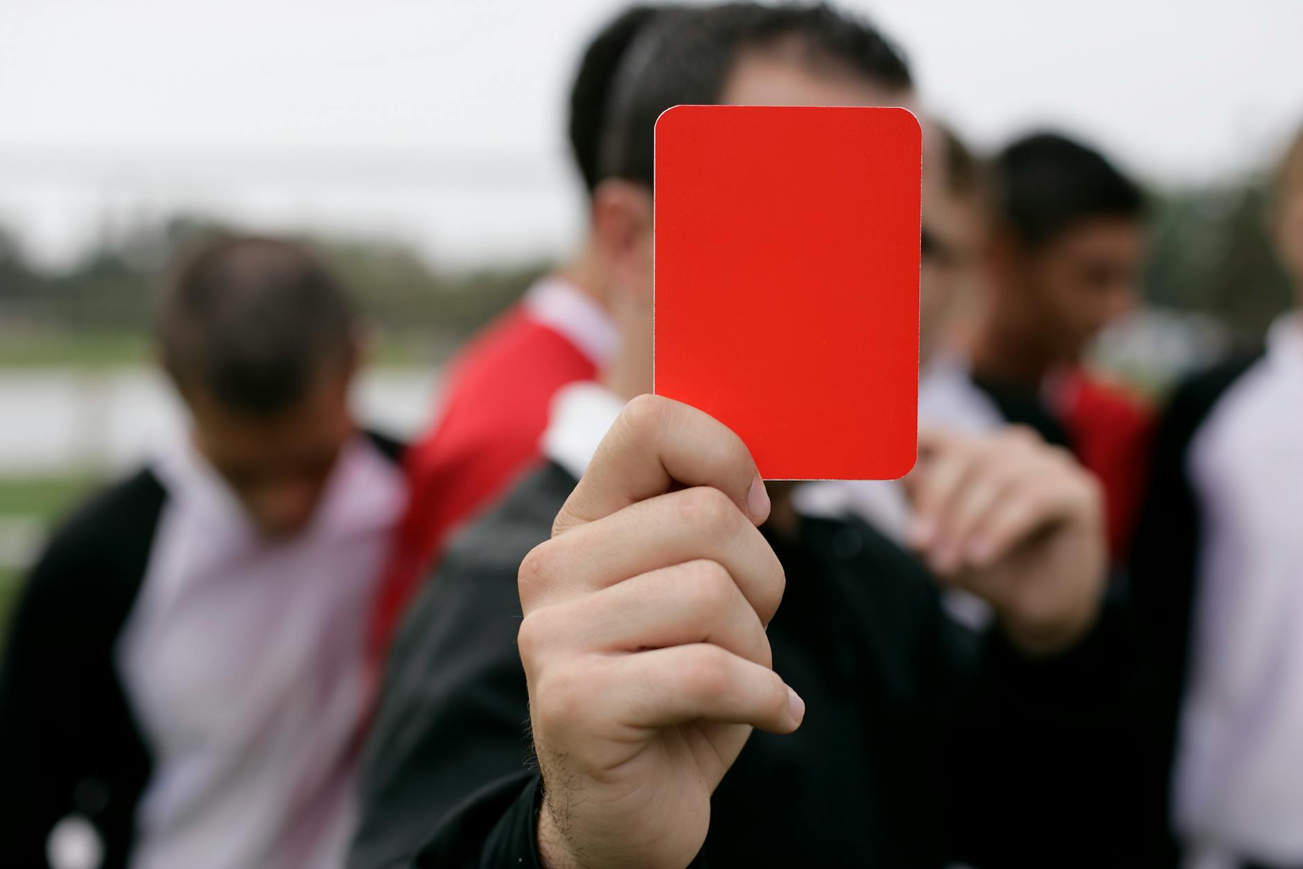 referee showing red card